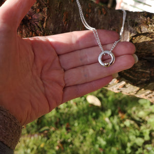 A look at the sizing of Elena's Embrace of the Angels Necklet, handcrafted from sterling silver with a gold heart.