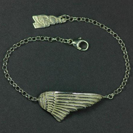 This Angel Wing Bracelet is handcrafted by Elena Brennan Jewellery and made from sterling silver.