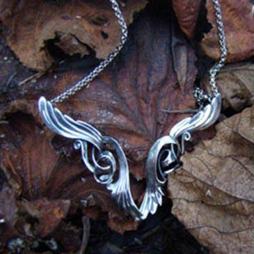 Large Angel Wings Pendant, handcrafted in sterling silver by Elena Brennan Jewellery.