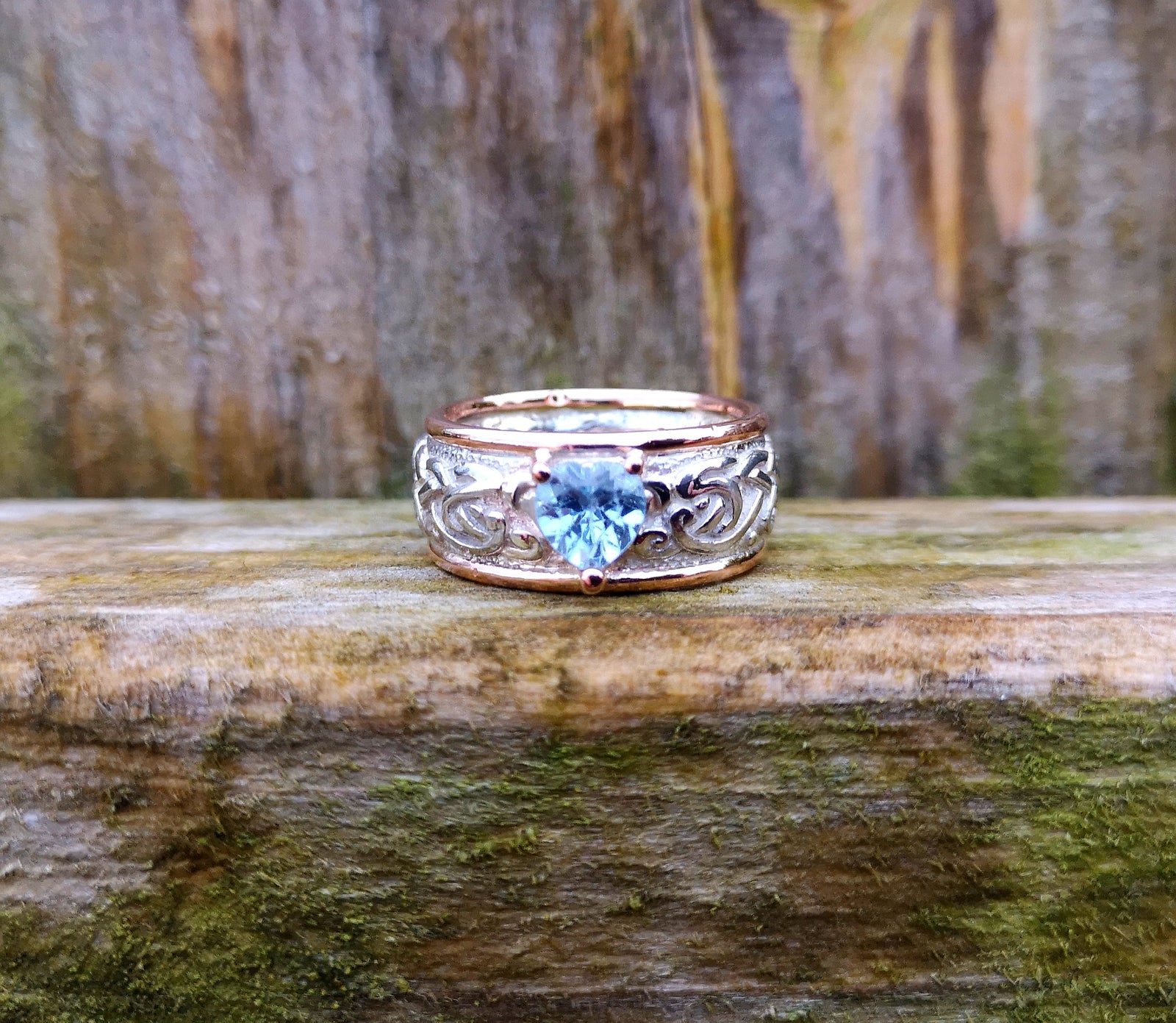 Celtic silver and rose gold band with aquamarine gemstone
